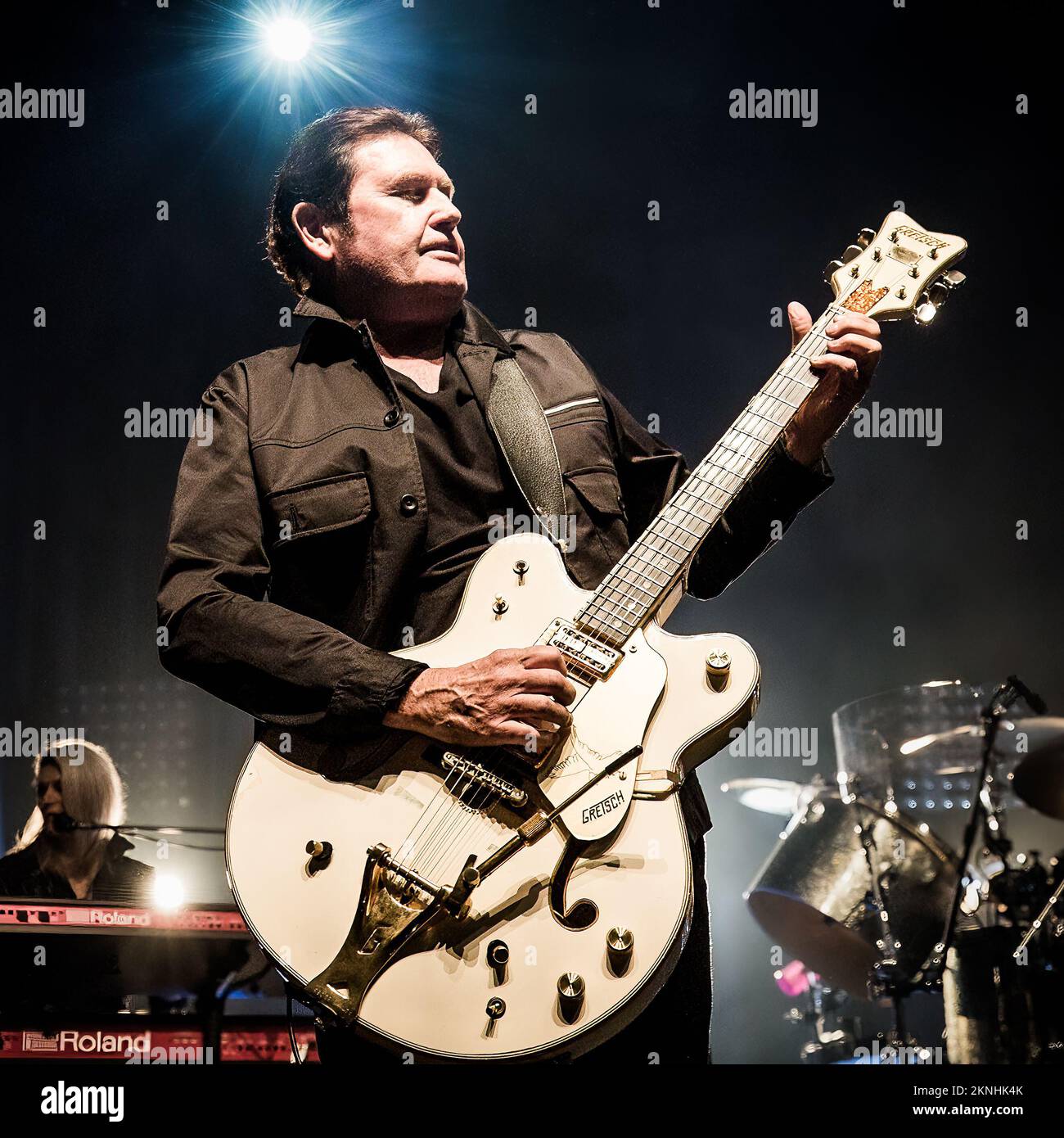 Charlie Burchill of Simple Minds performing live on stage Stock Photo