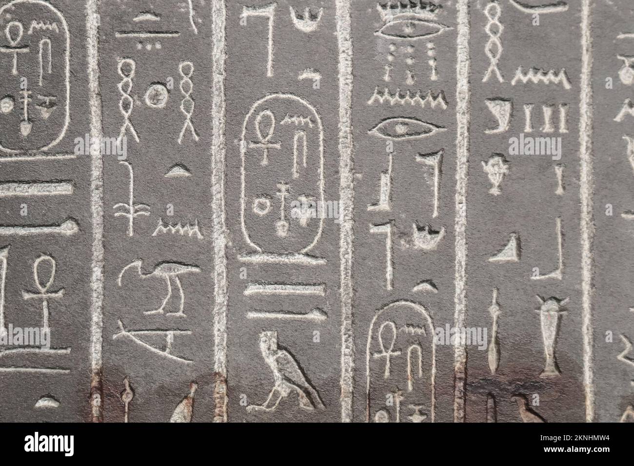 Carved ancient Egyptian writing or hieroglyphics-sacred carvings or mdju netjer meaning words of the gods Stock Photo