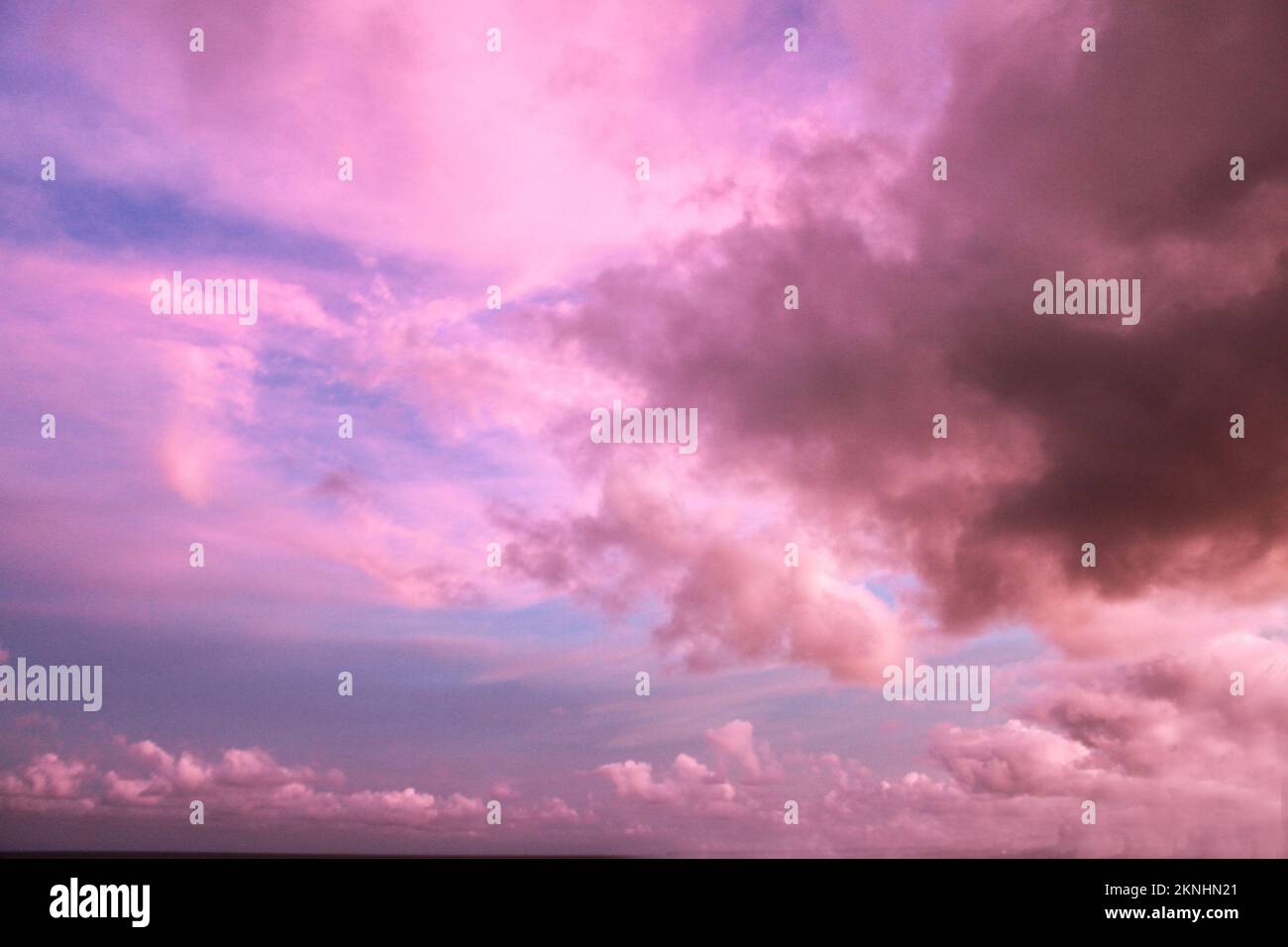 Crazy pink sky in the tropics before a storm Stock Photo