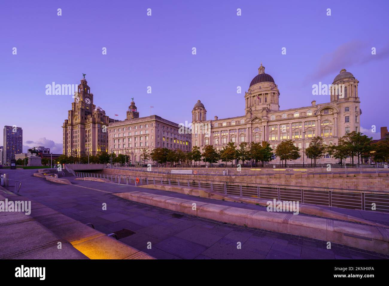 Liverpool, UK - October 07, 2022: Evening view of the Royal Liver Building, the Cunard Building, and the Port of Liverpool Building, in Liverpool, Mer Stock Photo