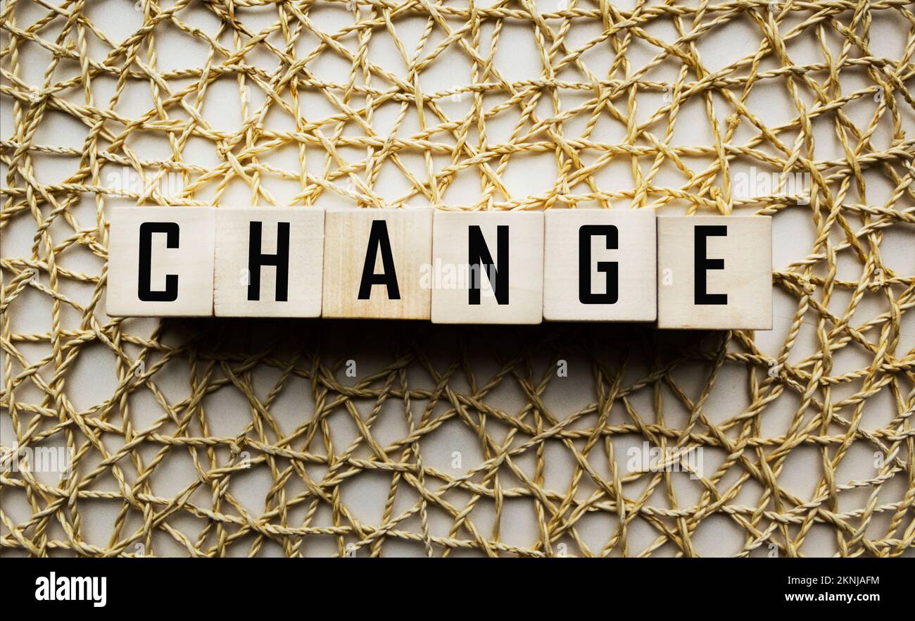 CHANGE word made from building blocks on vintage beige background Stock Photo