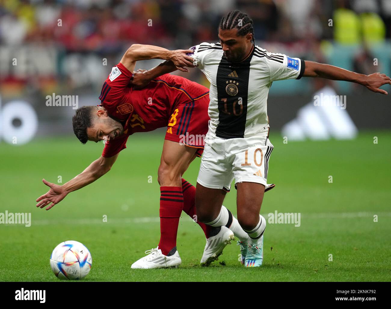 Spain's Jordi Alba (left) and Germany's Serge Gnabry battle for the ball during the FIFA World Cup Group E match at the Al Bayt Stadium, Doha, Qatar. Picture date: Sunday November 27, 2022. Stock Photo