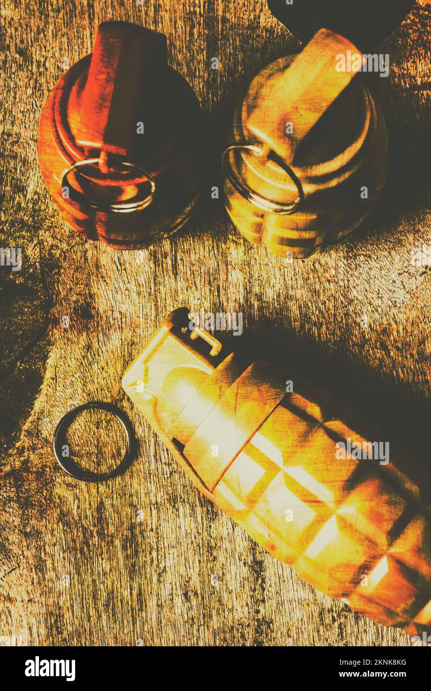 Conceptual for internal conflict with a pin pulled grenade ready to