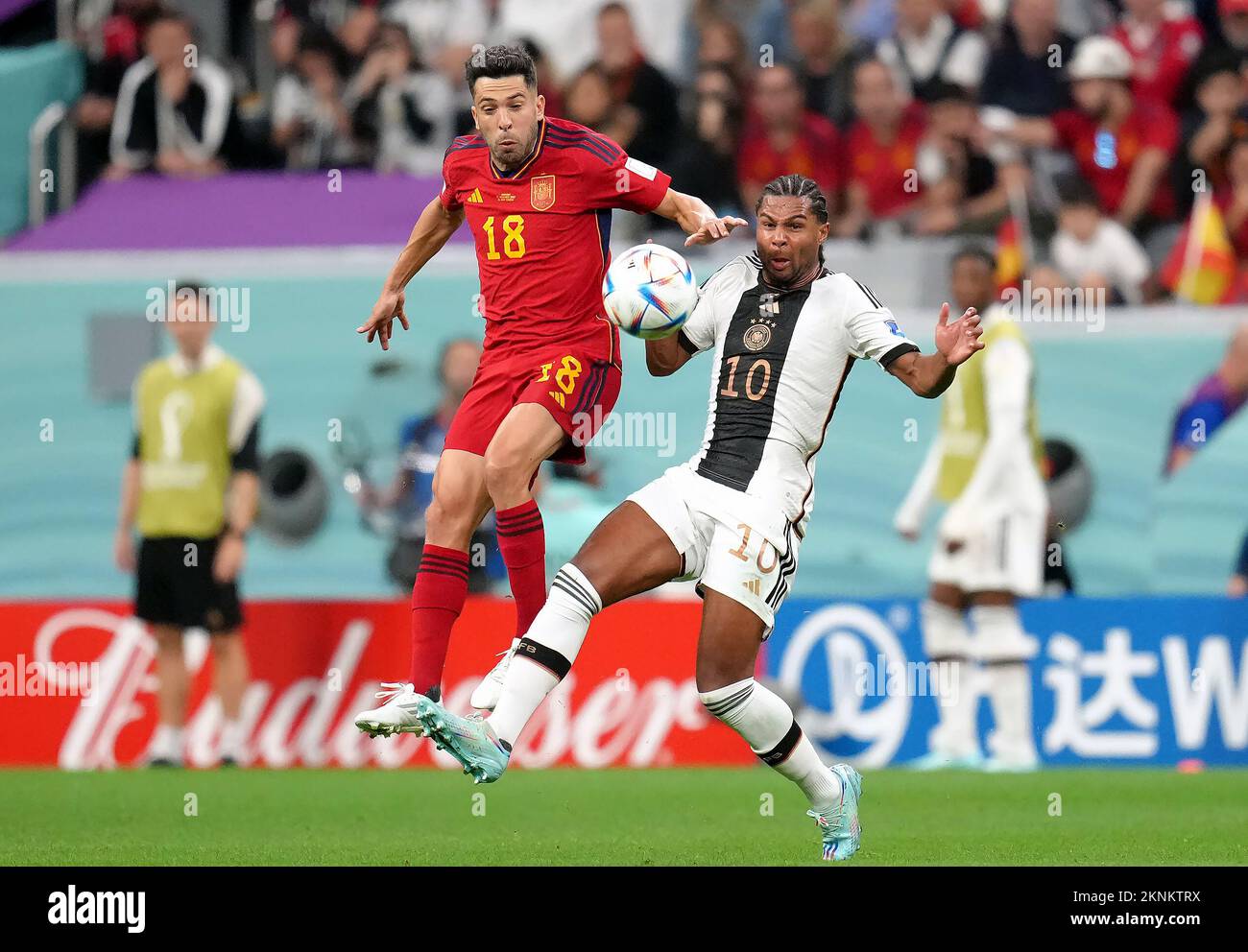 Spain's Jordi Alba (left) and Germany's Serge Gnabry battle for the ball during the FIFA World Cup Group E match at the Al Bayt Stadium, Doha, Qatar. Picture date: Sunday November 27, 2022. Stock Photo