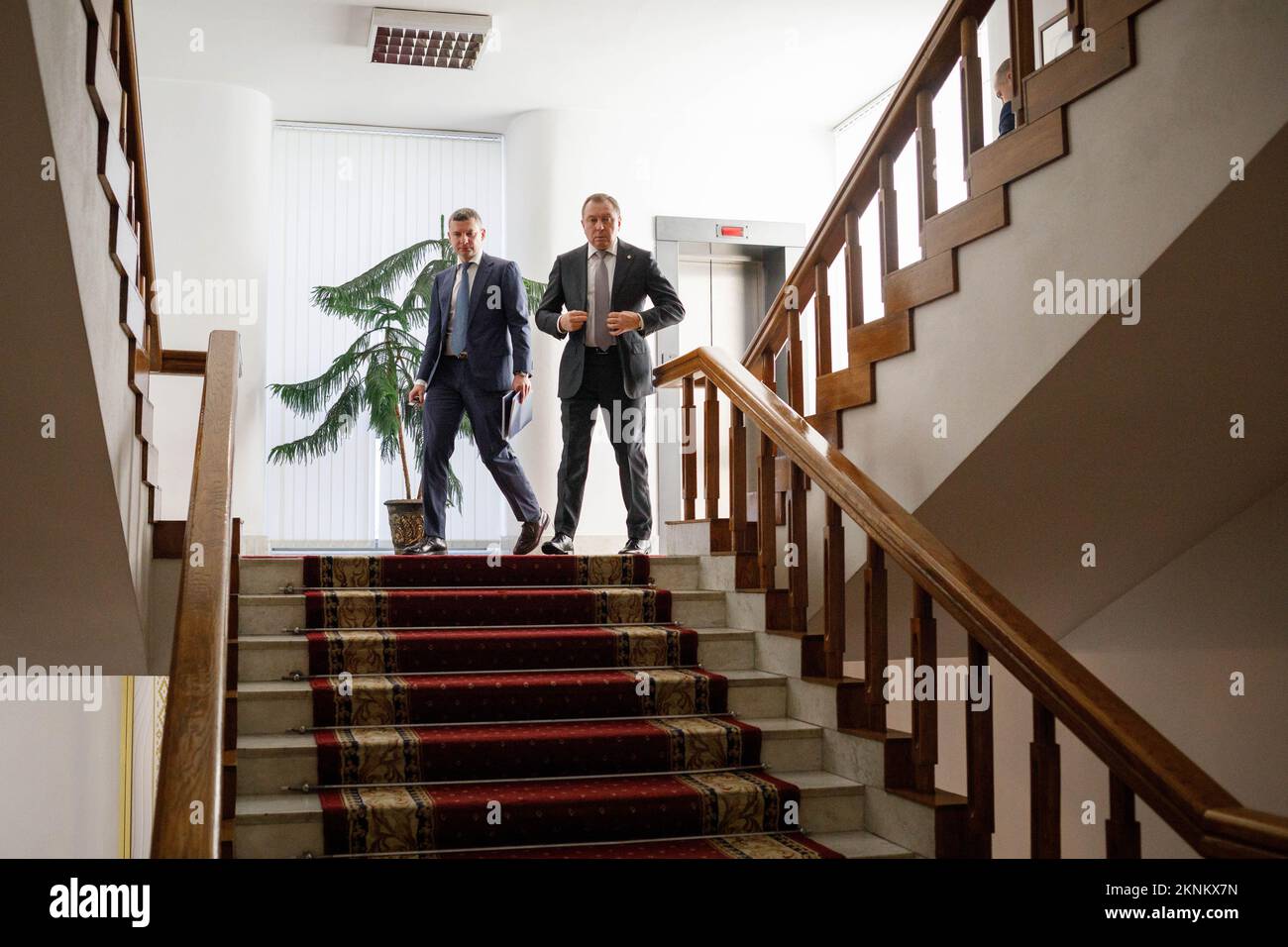 Vladimir Makei (or Uladzimir Makiej), the Minister of Foreign Affairs of the Republic of Belarus (left) and press-secretary of MFA Anatoly Glaz walk down to journalists before the interview starts. Vladimir Vladimirovich Makei (or Uladzimir Makiej) died in Minsk on November 26, 2022. He was 64 years old. There is no information that he had a chronic illness. Belarusian authorities did not state his cause of death. Makei served as the Minister of Foreign Affairs of Belarus from 2012 till his death in 2022. Since 2015 he has been perceived as a pretty democratic leader. After the mass protests i Stock Photo