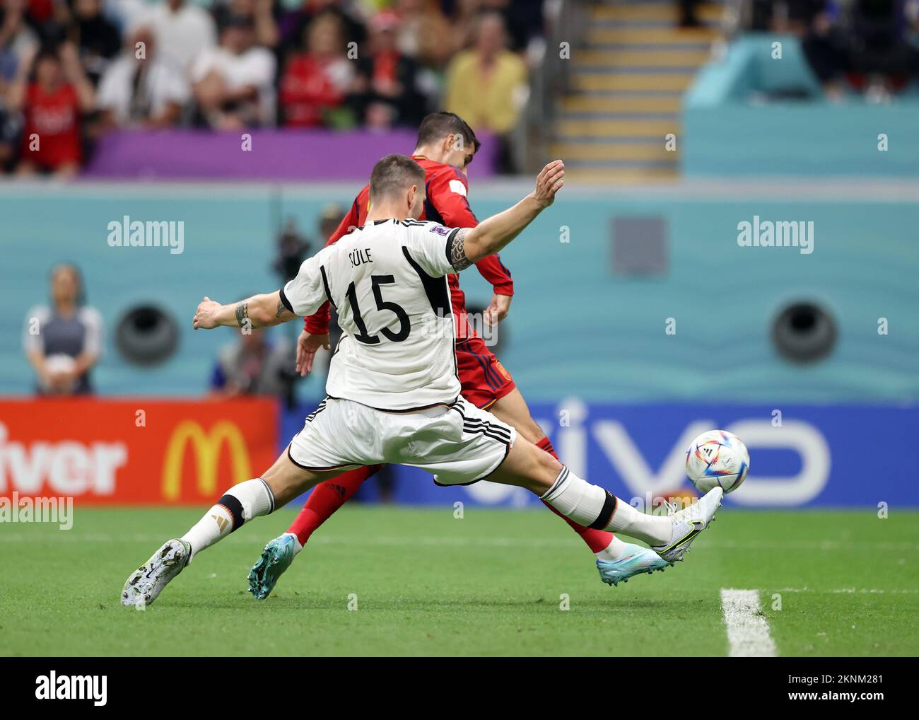 Al Khor, Qatar. 27th November 2022; Al Bayt Stadium, Al Khor, Qatar; FIFA World Cup Football, Spain versus Germany; Alvaro Morata of Spain shoots past Niklas Sule of Germany to score his sides 1st goal in the 62nd minute to make it 1-0 Credit: Action Plus Sports Images/Alamy Live News Stock Photo