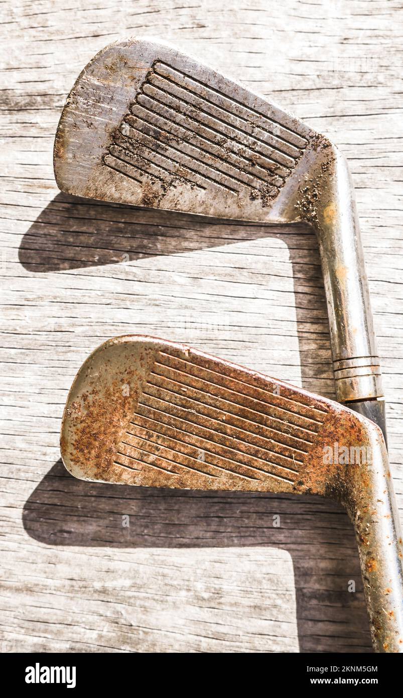Golfing antiquities paired with a double shot of old club irons aged in