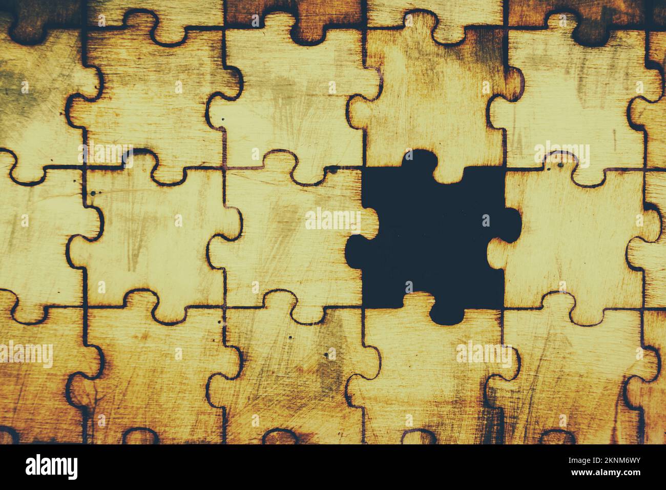 Puzzles and missing pieces lay unfinished in tones of nostalgia. Hole