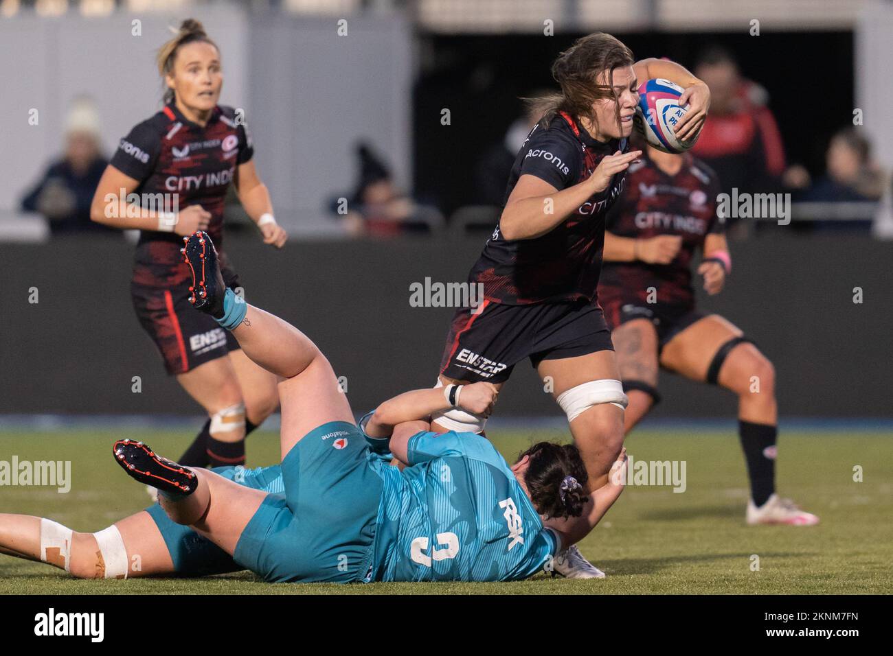 Louise McMillan #6 of Saracens Women is caught by  Andrea Stock #3 of Wasps Women during the Women's Allianz Premier 15's match Saracens Women vs Wasps Women at StoneX Stadium, London, United Kingdom, 27th November 2022  (Photo by Richard Washbrooke/News Images) Stock Photo