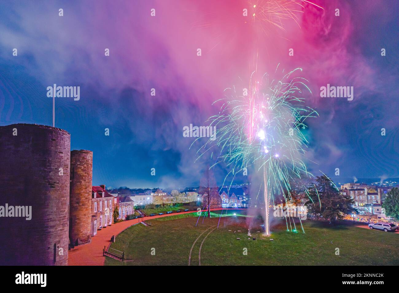 Tonbridge, Kent, England. 26 November 2022. The Medieval 13th Century Tonbridge Castle viewed from the Motte, lit by a fireworks finale following the Christmas Lights switch on in this market town in Kent. ©Sarah Mott / Alamy Live News. Stock Photo