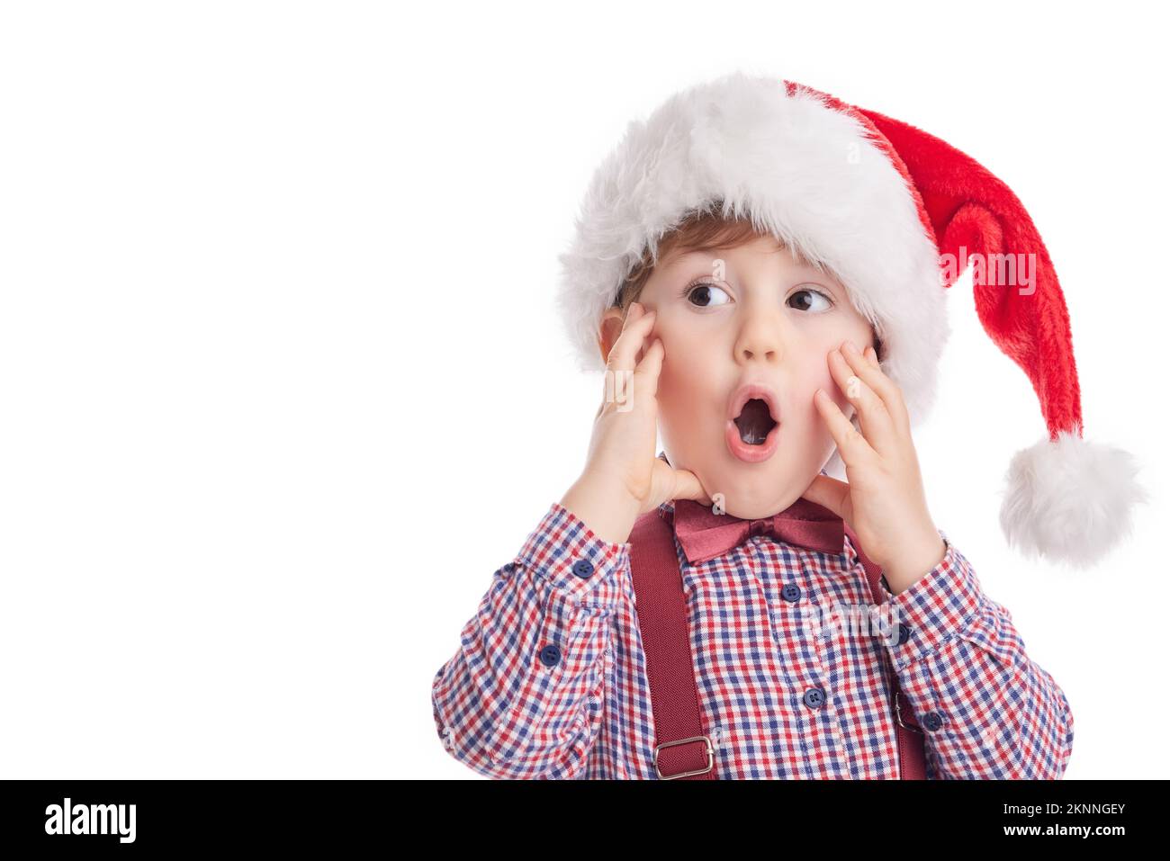 Good baby boy with tie and suspender in Santa Claus cloth, Christmas concept Stock Photo