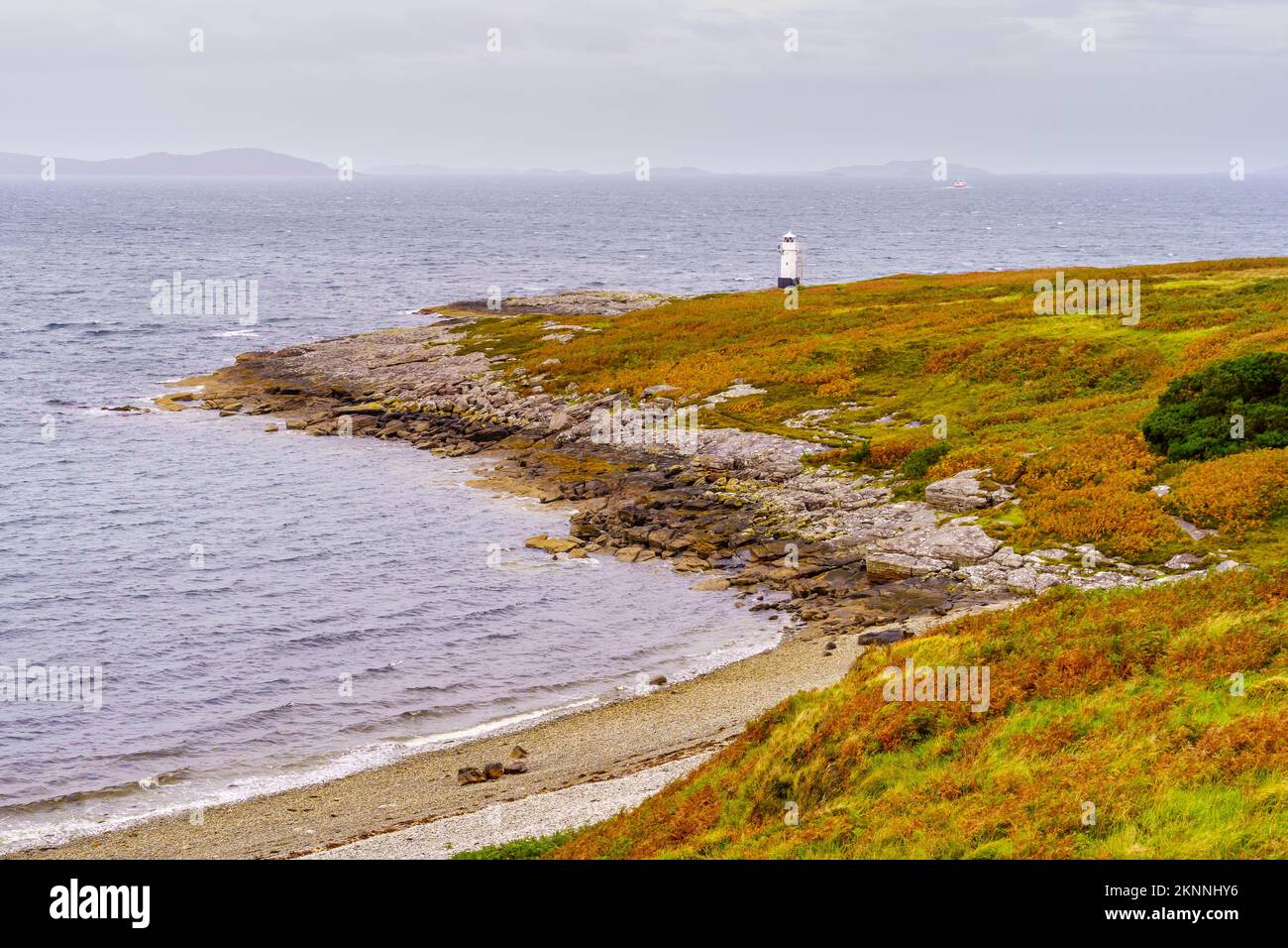 View of coastal landscape, and the Rhue Lighthouse, in the Highlands, Scotland, UK Stock Photo