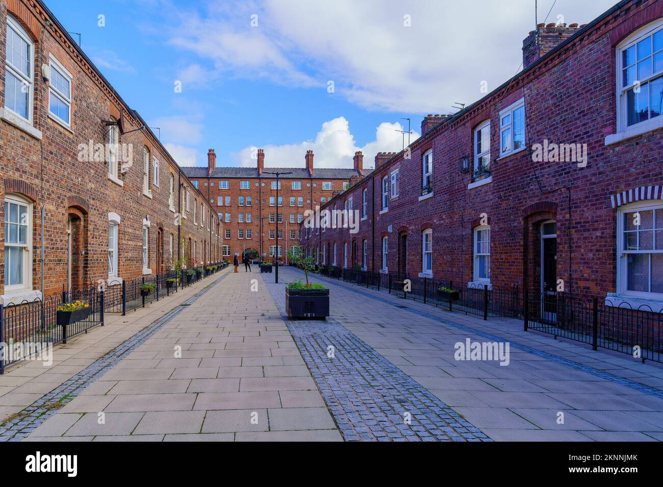 View of an alley with old red bricks buildings, in the Ancoats neighborhood, Manchester, England, UK Stock Photo