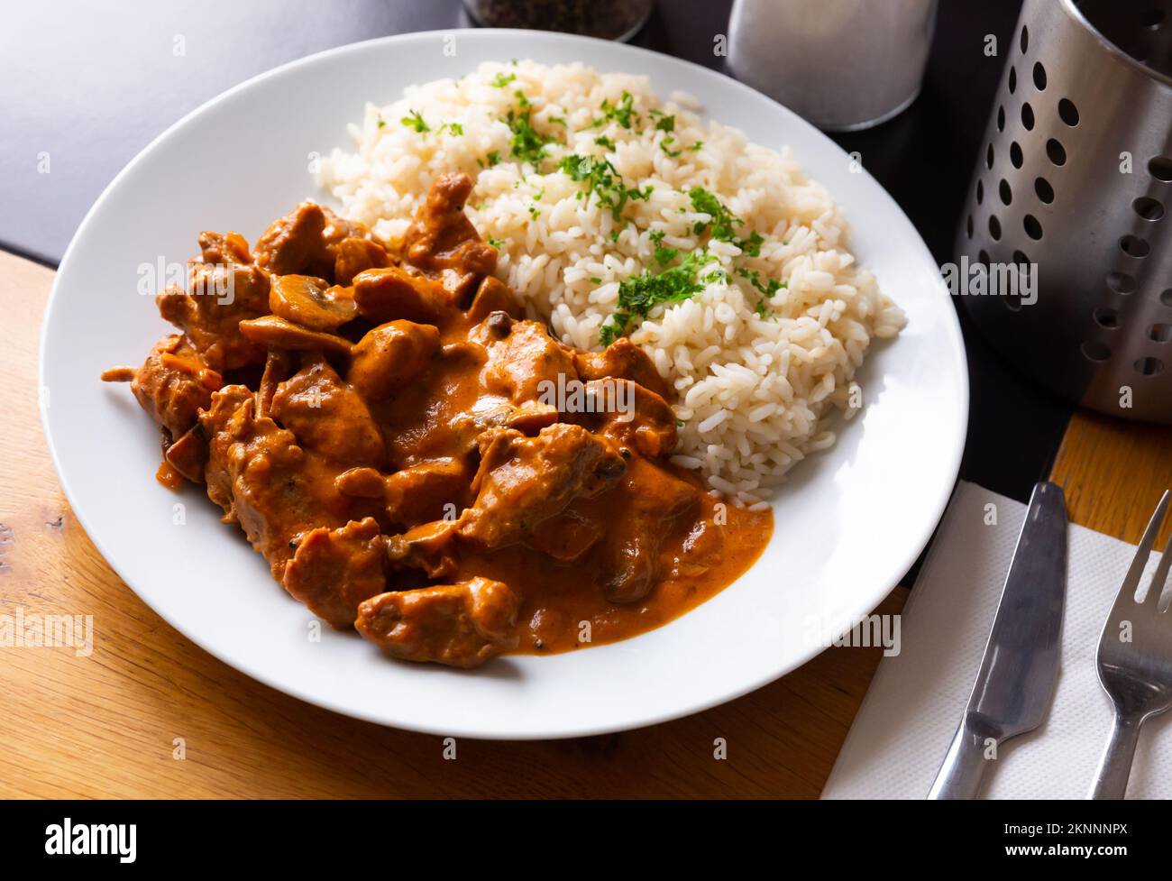 Beef stroganoff with rice Stock Photo - Alamy