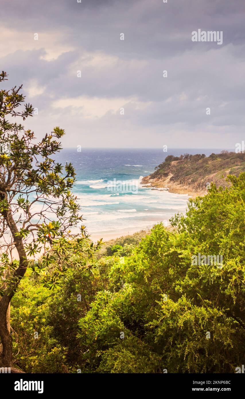 Soothing scenic overview from a higher grounding, to waves, sand and