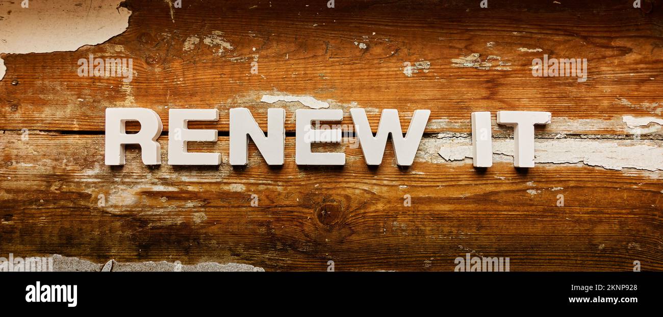 Renew It - Text on old shabby wooden planks Stock Photo - Alamy