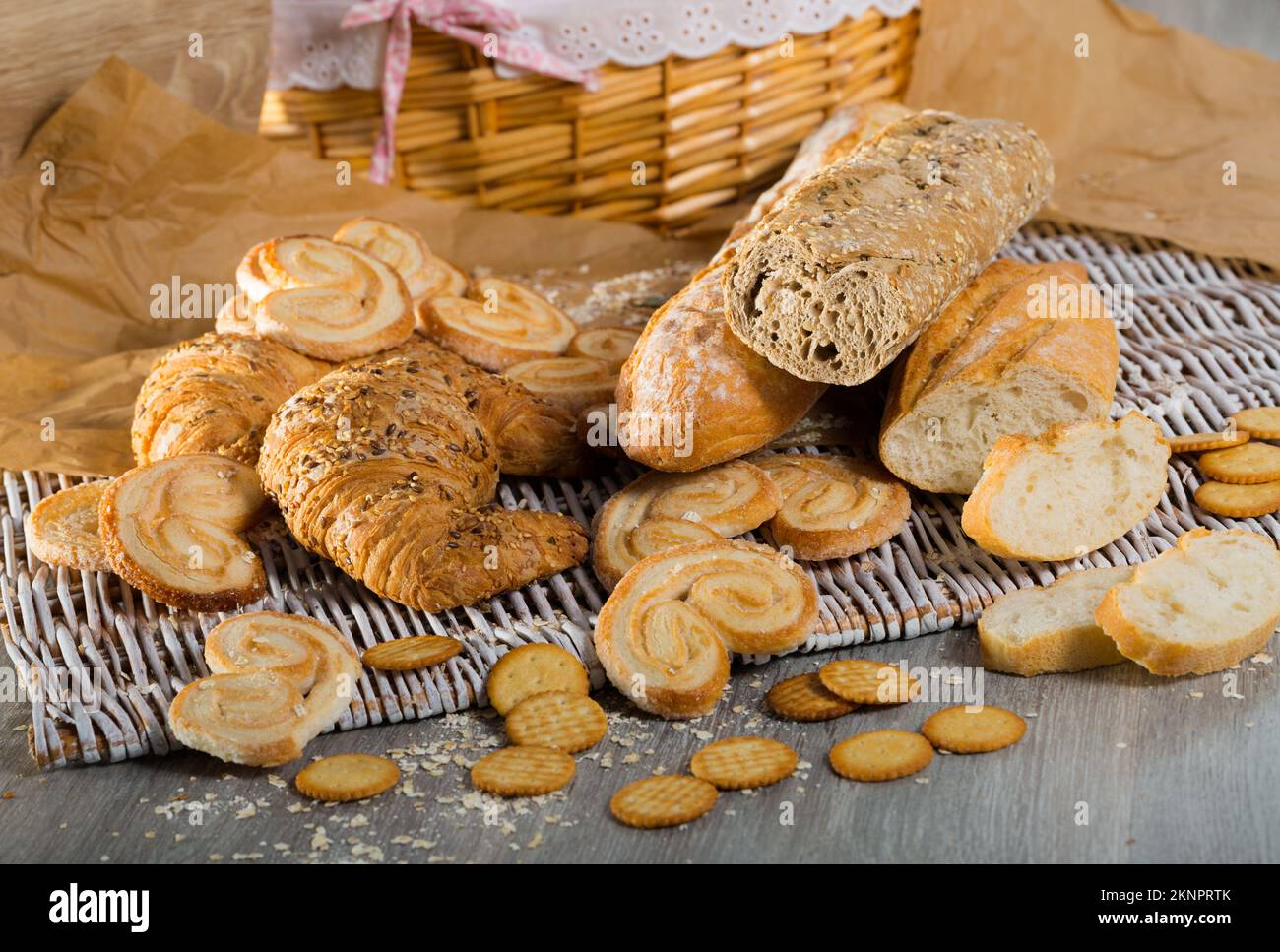 Various bakery products on rattan mat Stock Photo