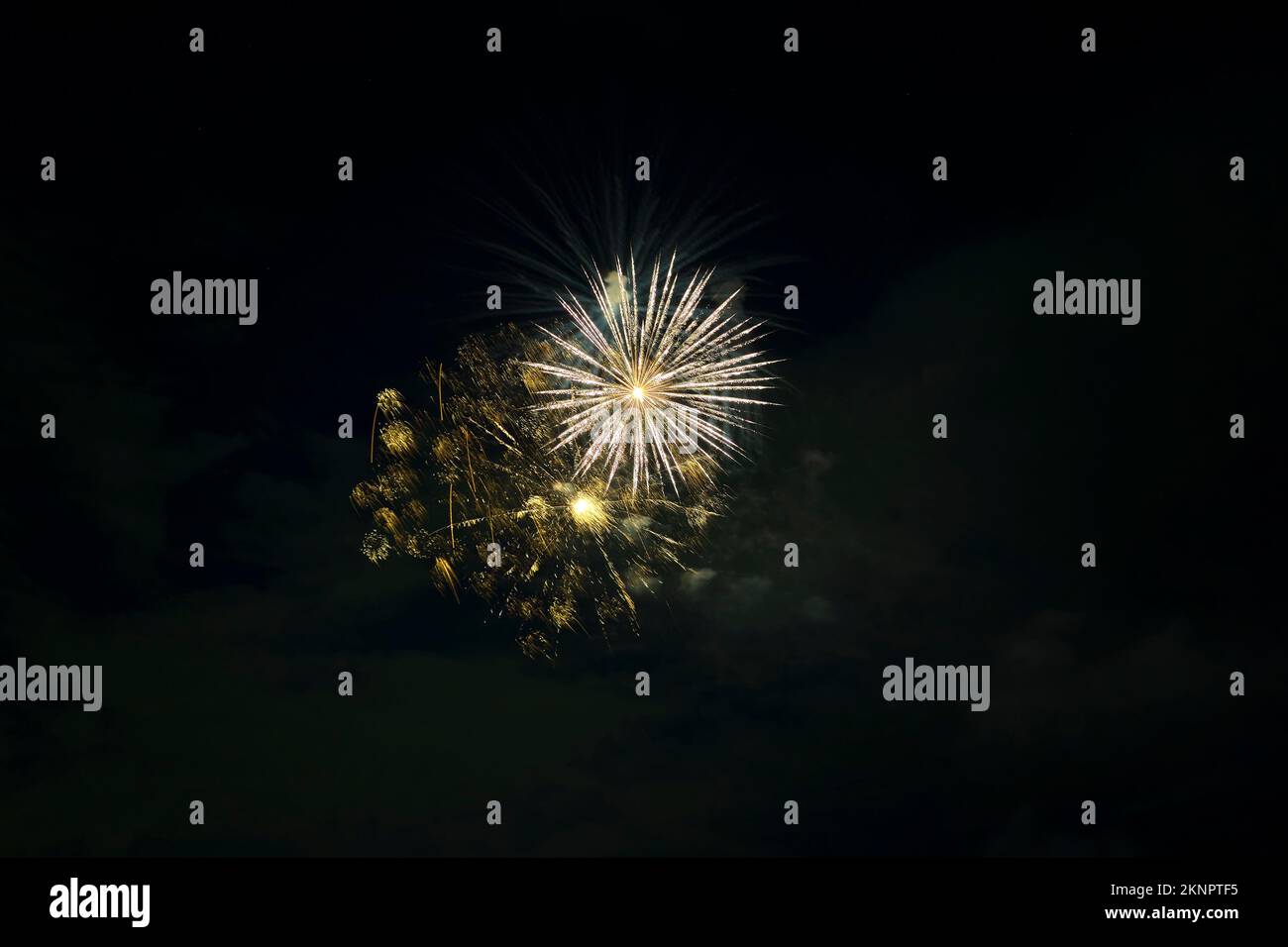 Aerial view of bright fireworks exploding with colorful lights against ...