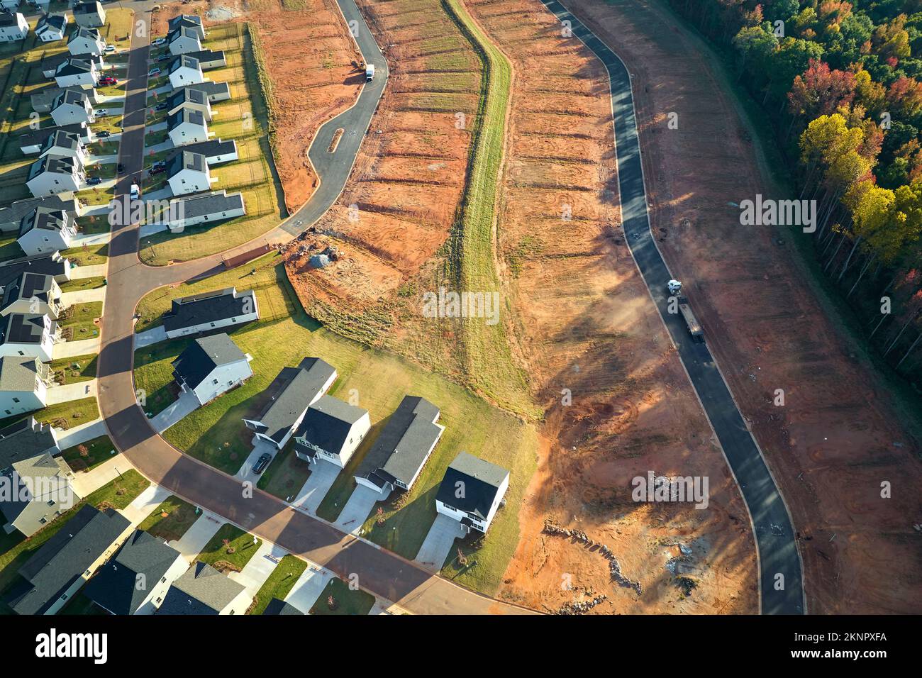 Aerial view of construction site with new tightly packed homes in South ...