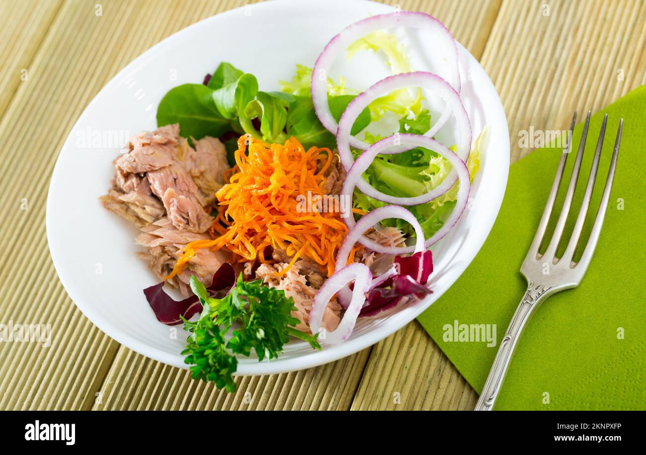 Salad with carrots, canned tuna, onion Stock Photo Alamy