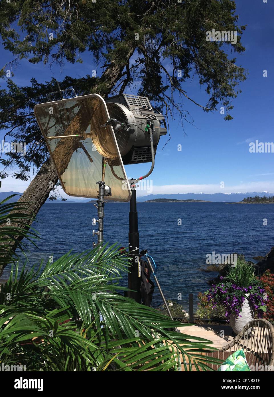 Movie spotlight with diffusion set up for an exterior film shoot on