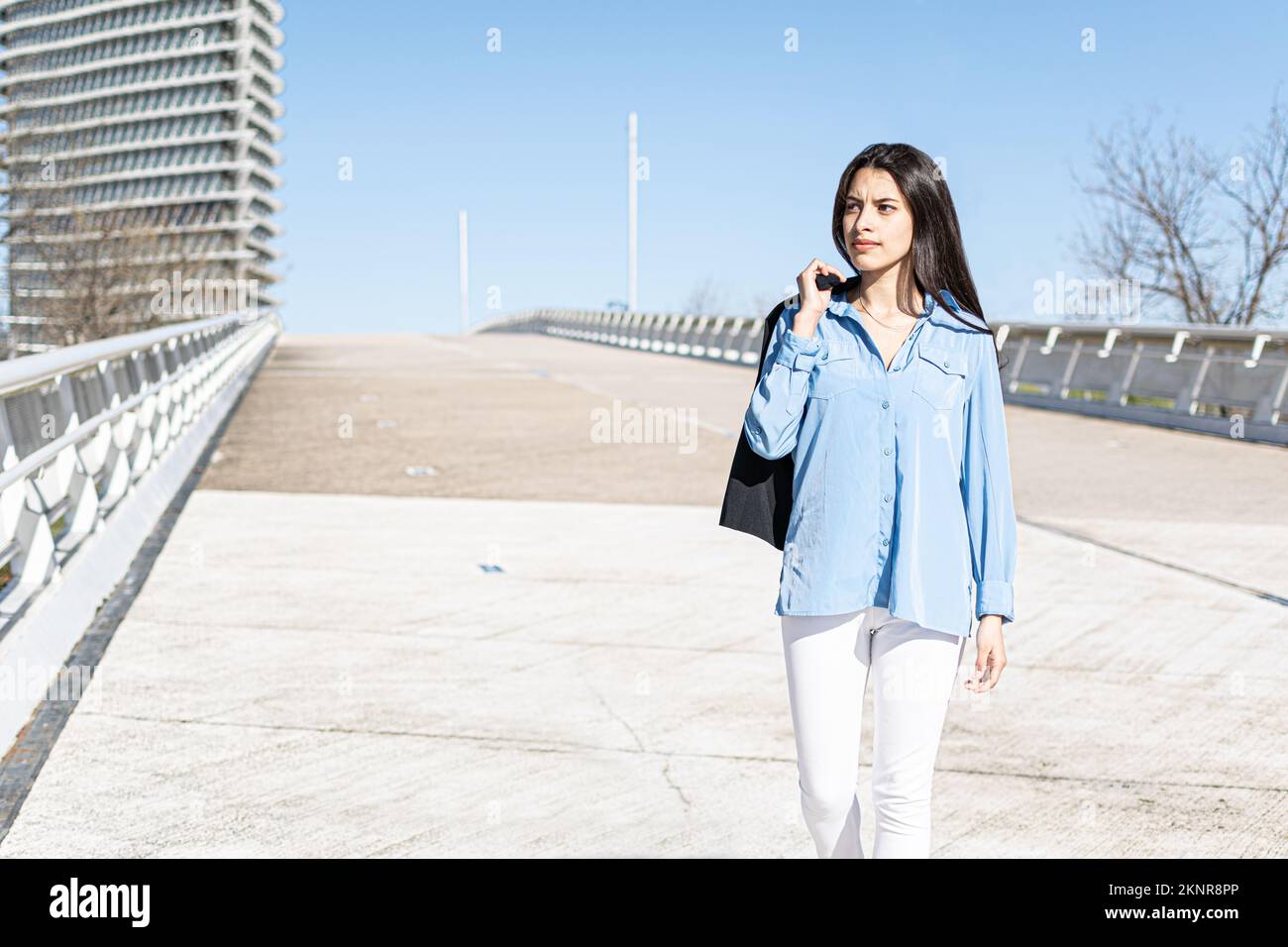Young business woman walking on hi-res stock photography and images - Alamy