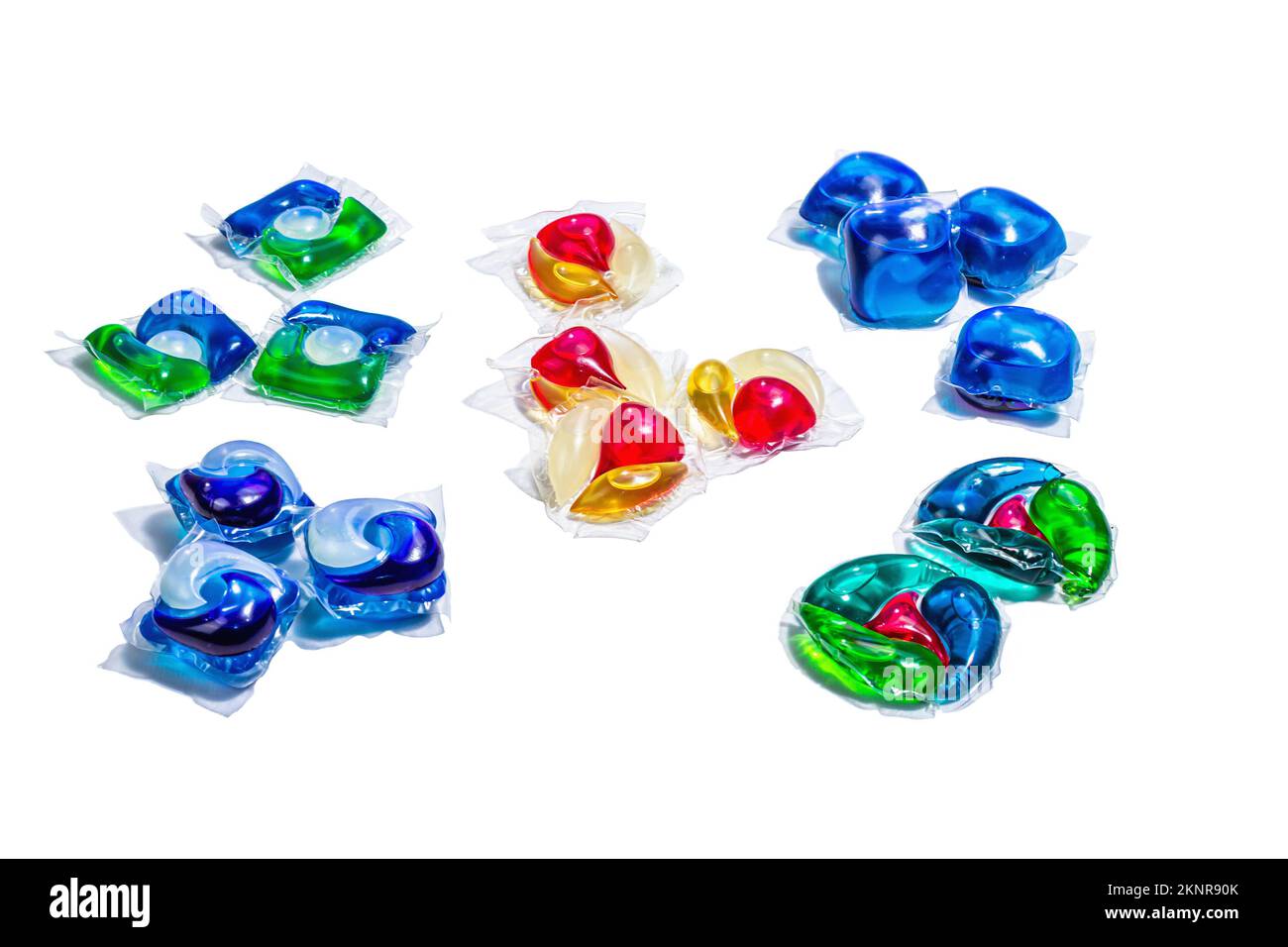 Assorted capsules with detergent for washing machine isolated on white