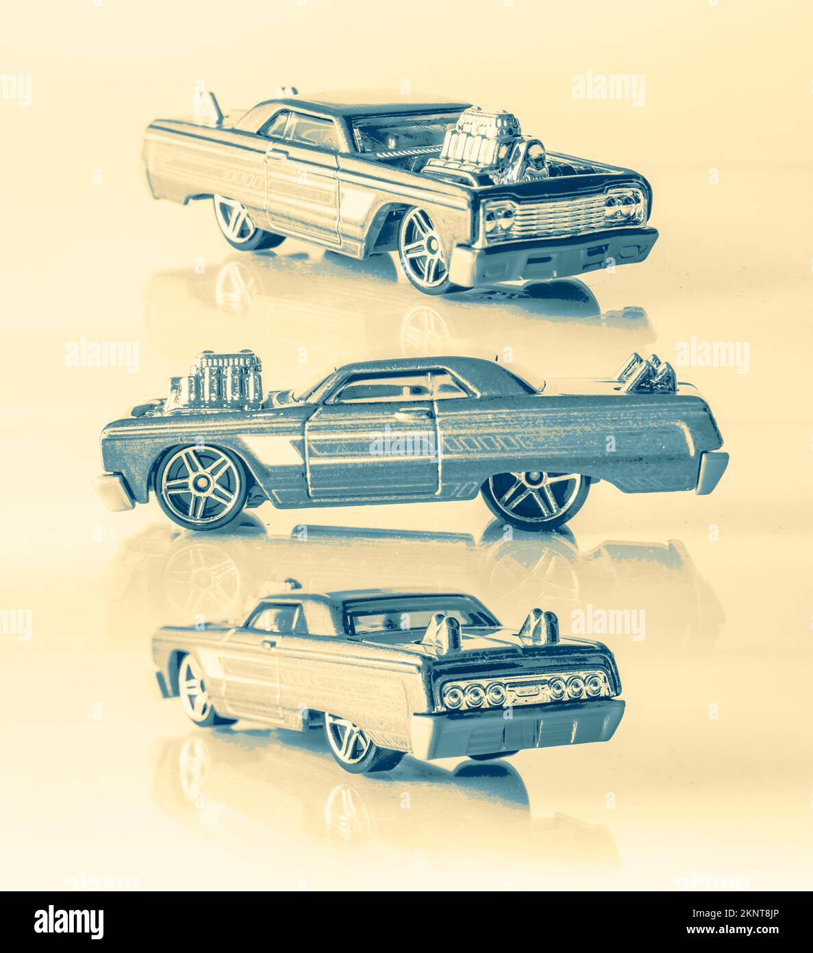 Retro toned vehicle art on a triptych of model 64 Chevy impalas. Model Impala Stock Photo