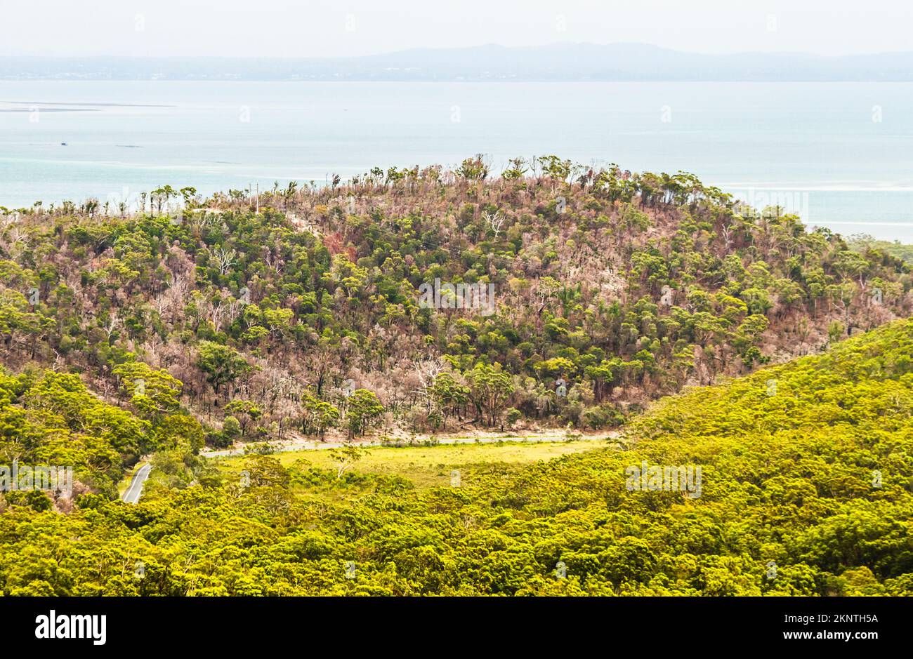 Landscape photo on an island inland roadway traversing hills and lush