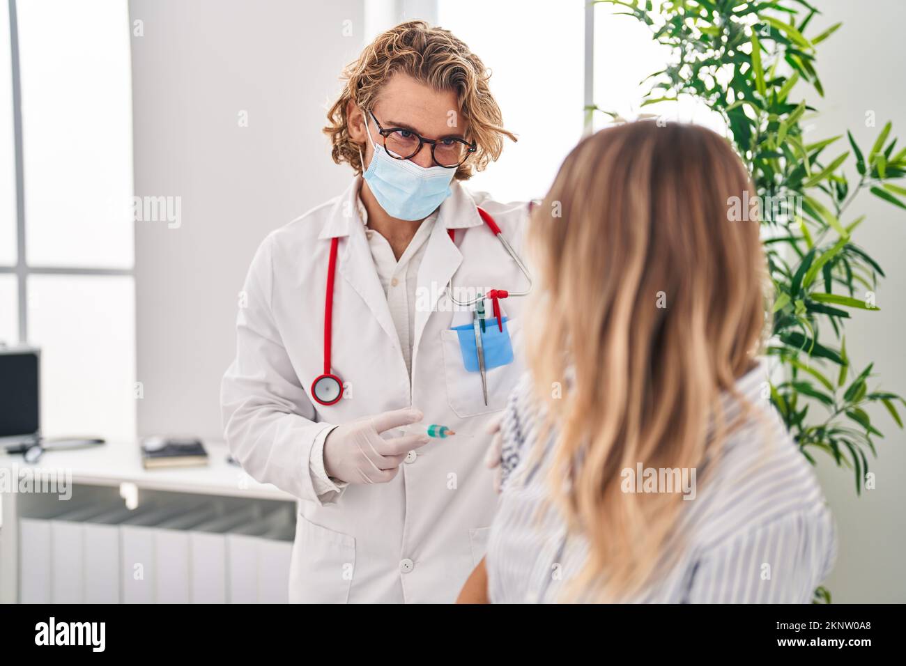 Woman having injection syringe arm hi-res stock photography and images ...