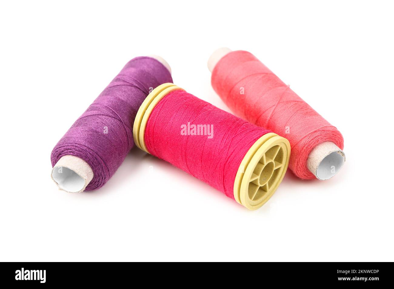 Sewing thread spools isolated on white background Stock Photo - Alamy