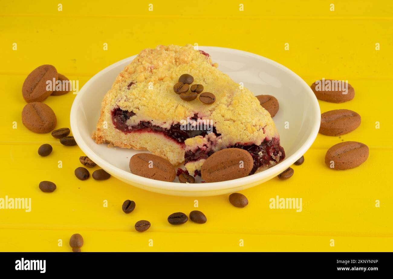 yellow cake with coffee beans Stock Photo Alamy