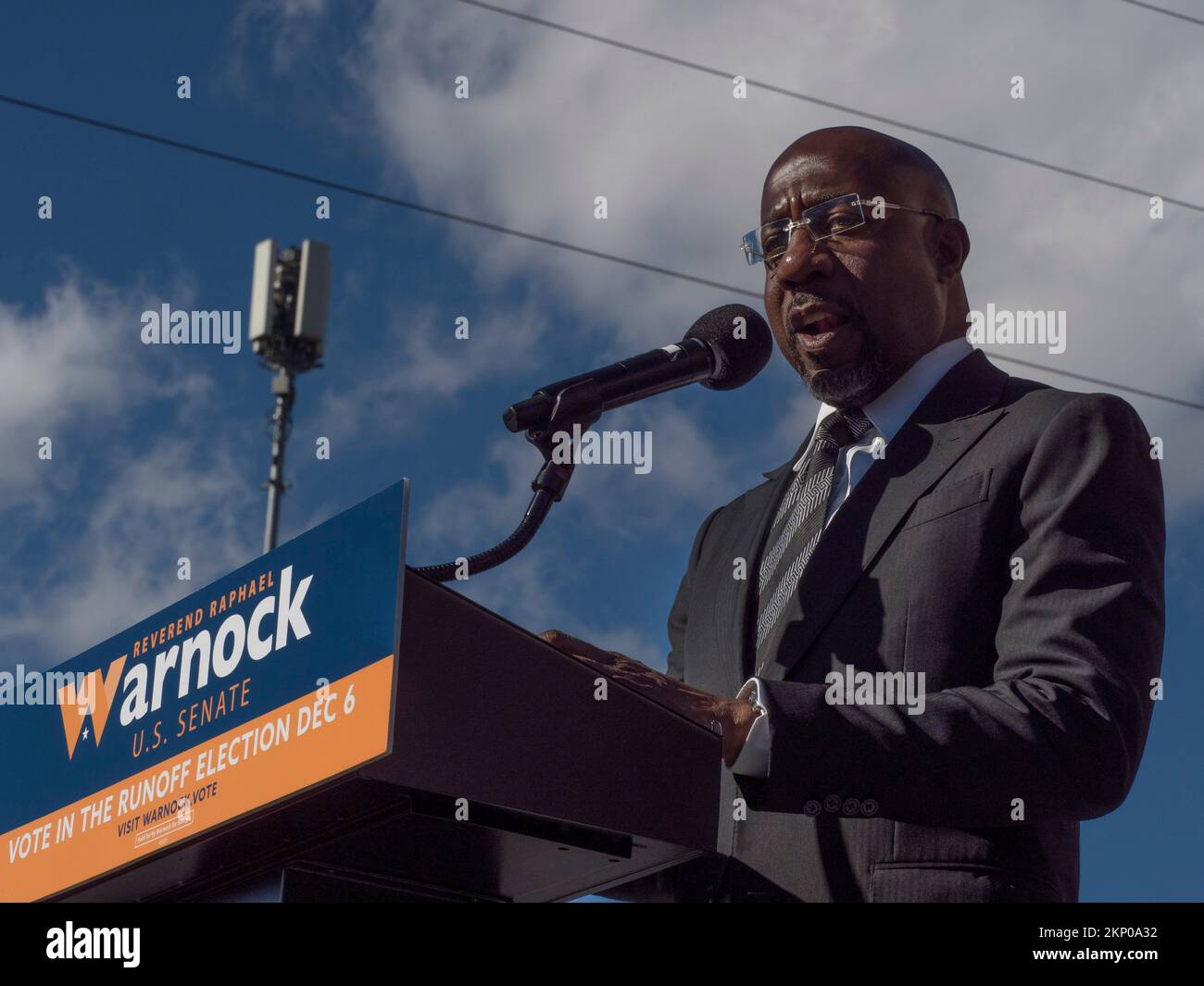 Atlanta, Georgia, USA. 27th Nov, 2022. Reverend Raphael Warnock continued his 'One More Time' Runoff Tour to turn out the vote for his re-election to the U.S. Senate. He spoke of the importance of going to the polls to vote before heading a march to the polls. (Credit Image: © Sue Dorfman/ZUMA Press Wire) Credit: ZUMA Press, Inc./Alamy Live News Stock Photo