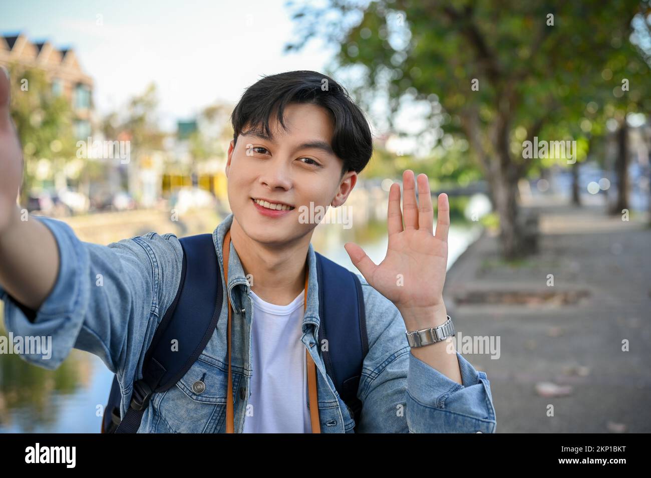 Thai man waving hi-res stock photography and images - Alamy