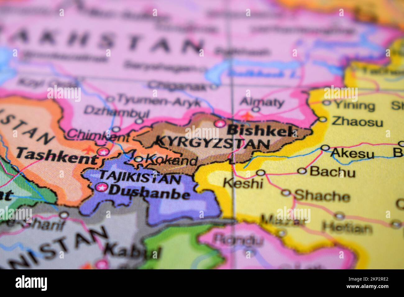 Kyrgyzstan  Travel Concept Country Name On The Political World Map Very Macro Close-Up View Stock Photograph Stock Photo