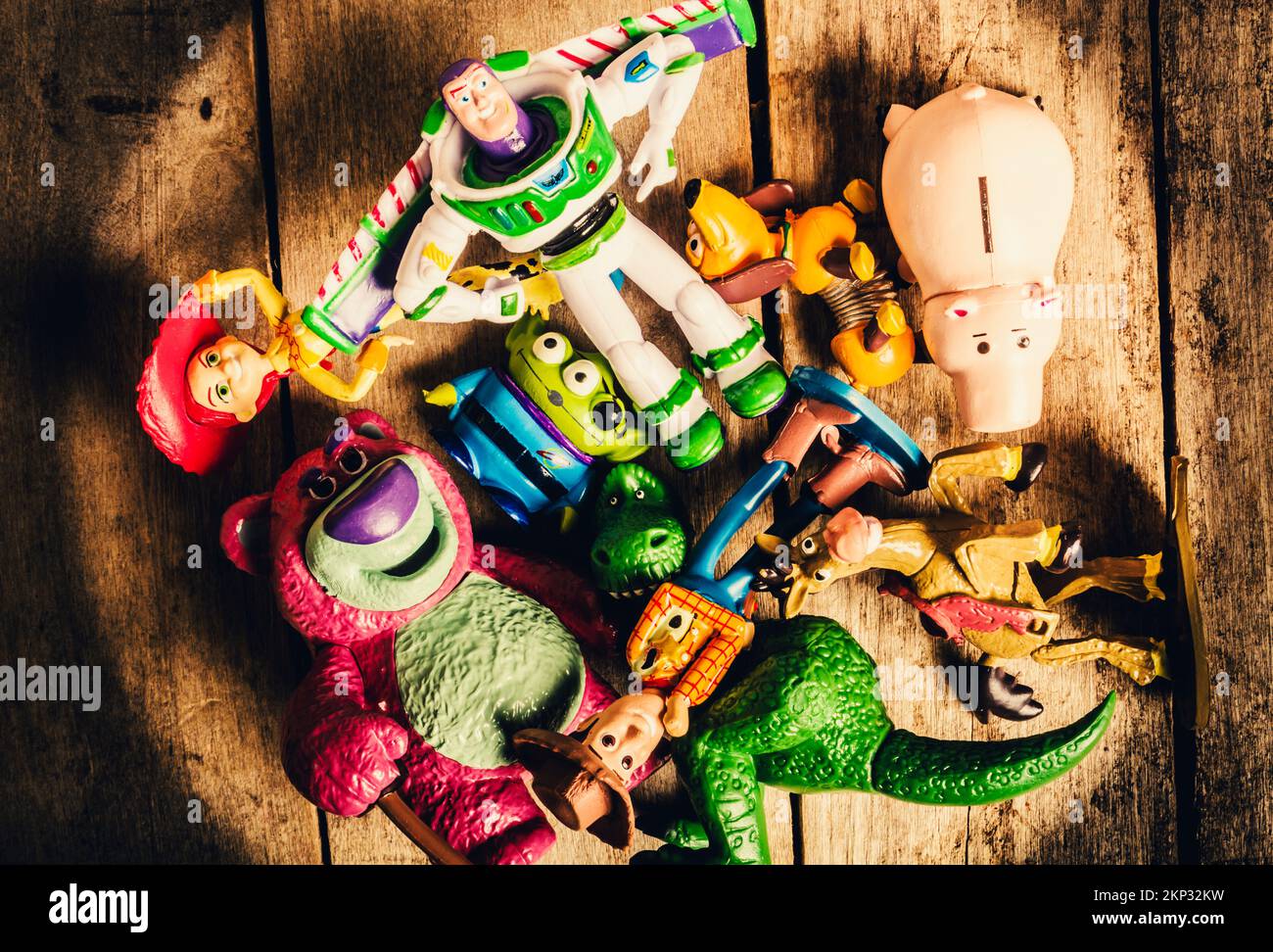 Rustic wooden still life scene on a heap of preschool play toys from