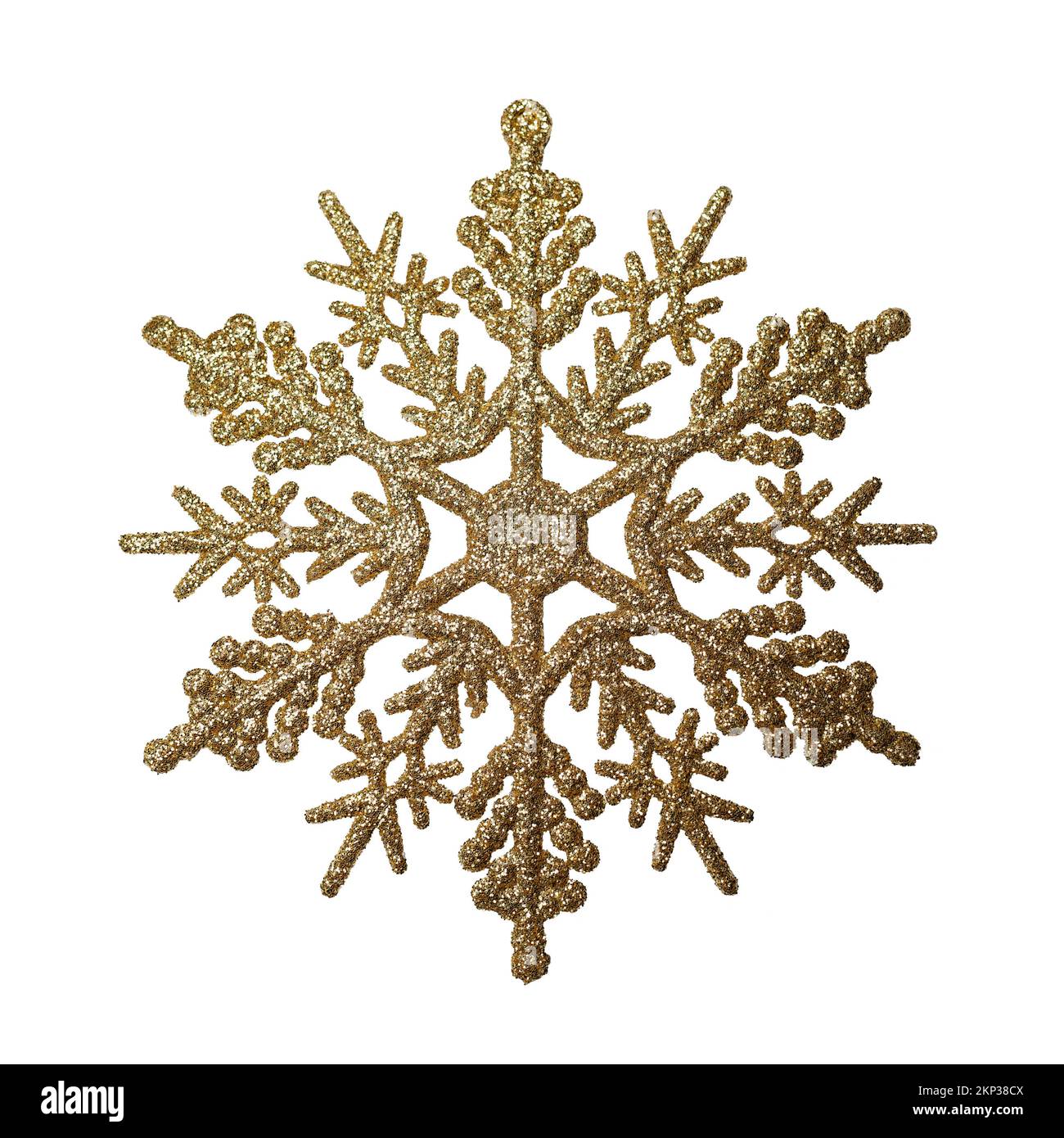 Golden glittered snowflake ornament for Christmas tree decoration with clipping path Stock Photo