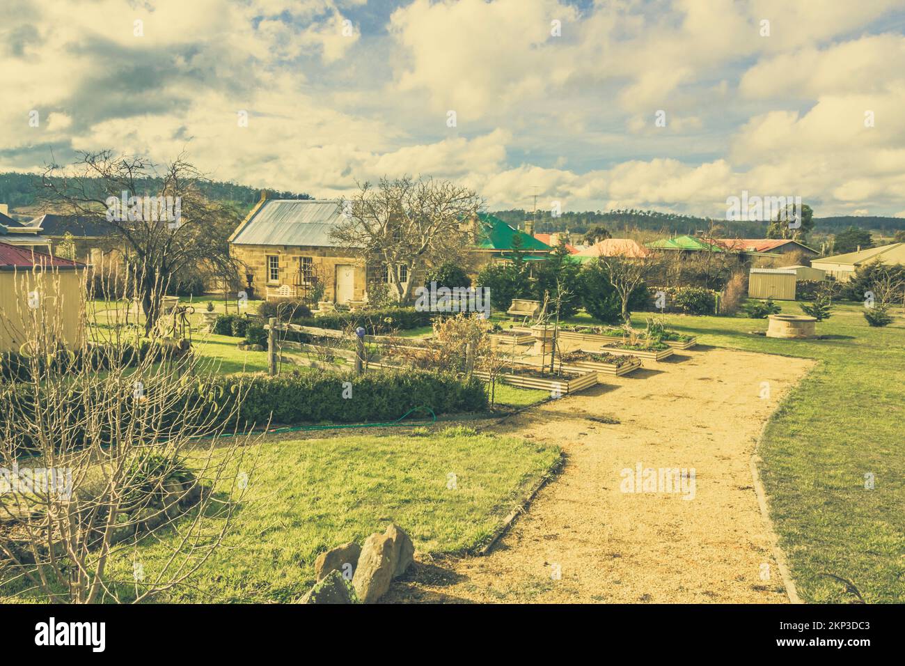 Quaint english like paths and gardens in old pastel toned villages