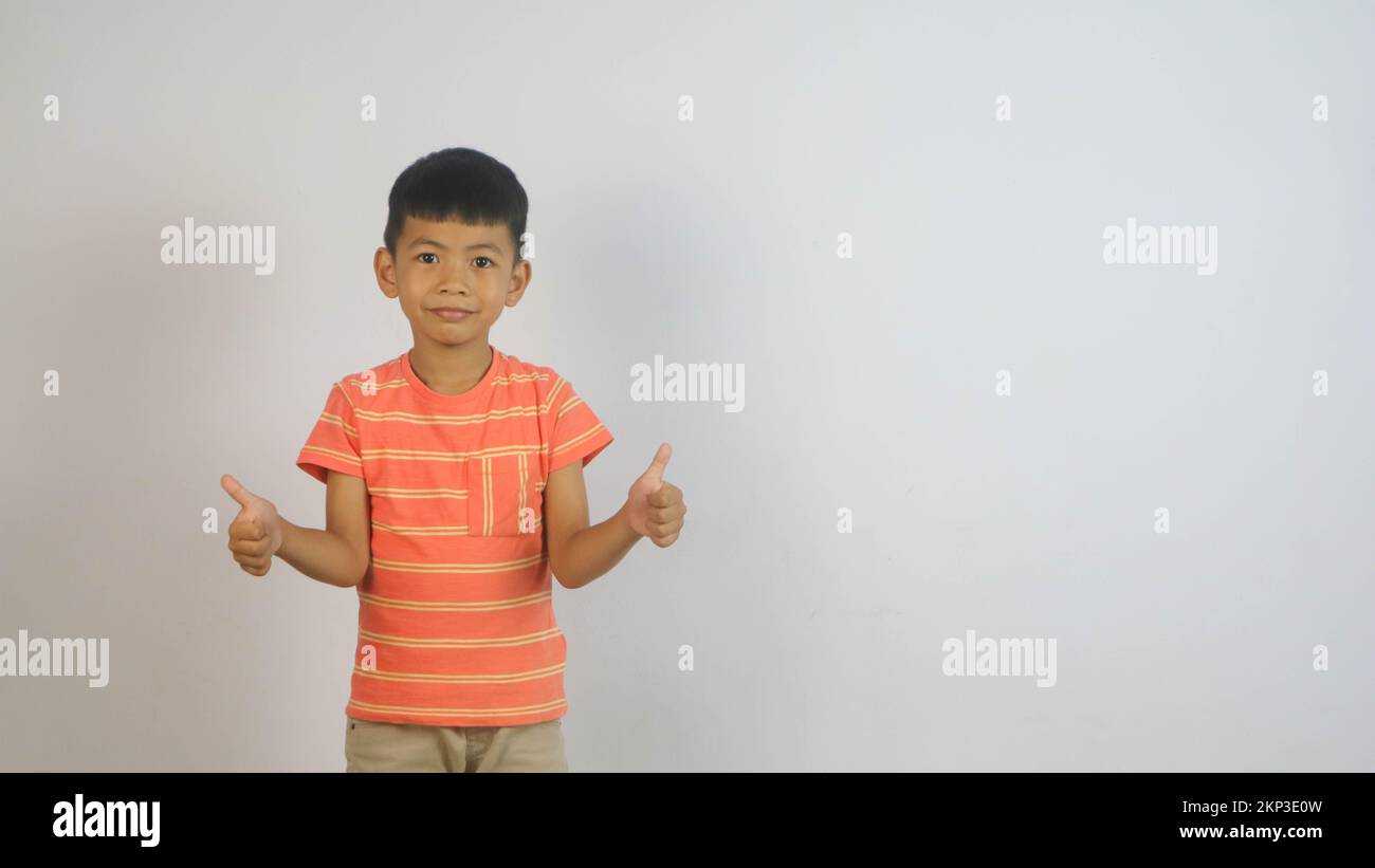 Cute Asian boy isolated on white background Stock Photo - Alamy
