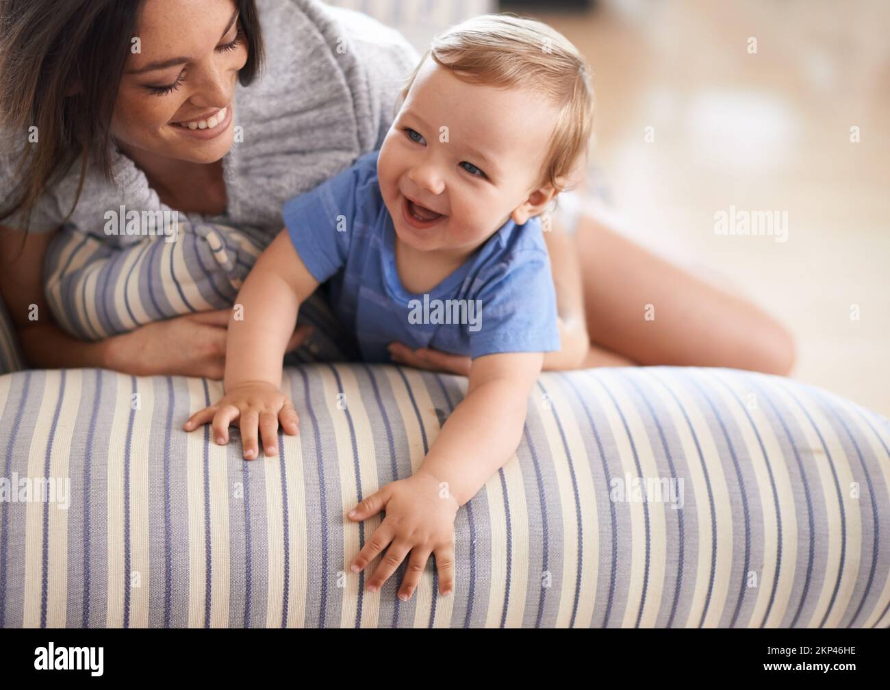 She takes after her mom. An adorable little girl with her mother Stock