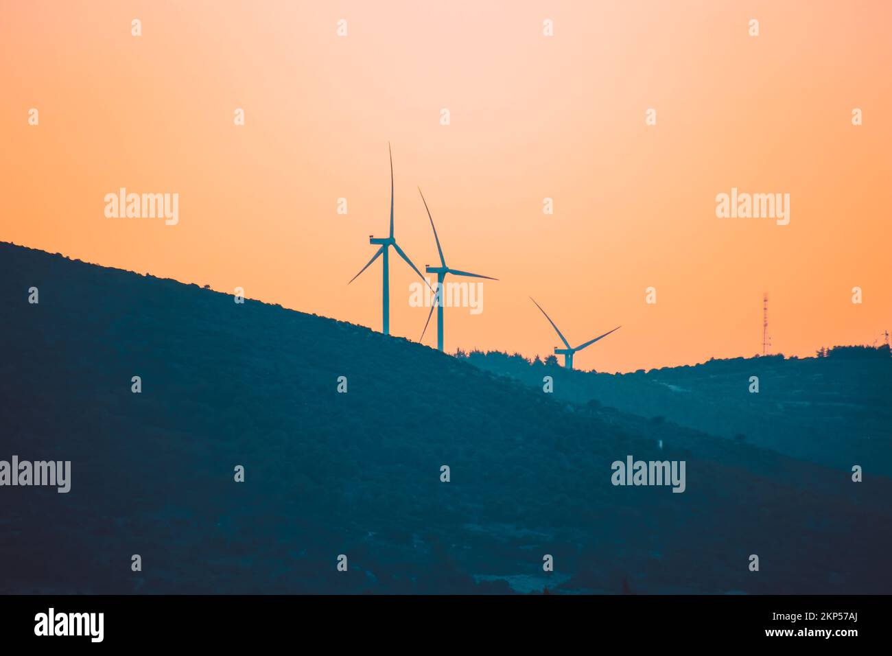 Wind turbine silhouettes at sunset Stock Photo - Alamy