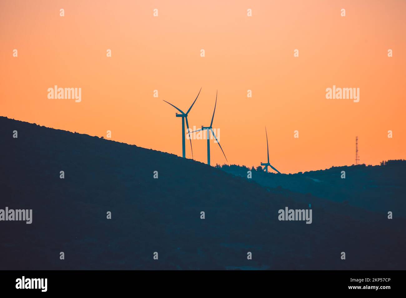 Wind turbine silhouettes at sunset Stock Photo - Alamy