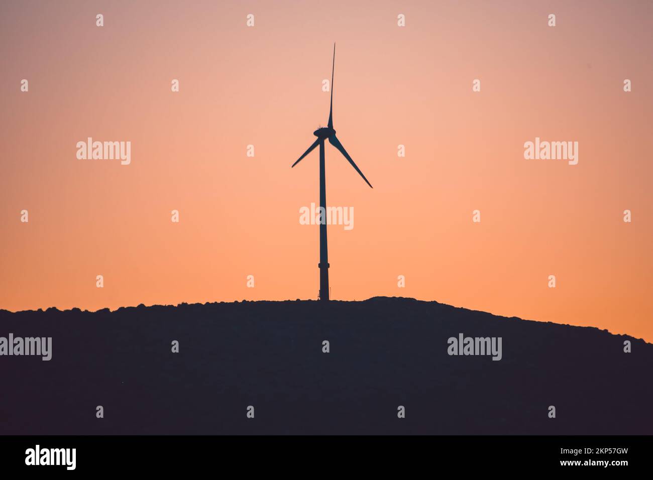 Wind turbine silhouettes at sunset Stock Photo - Alamy