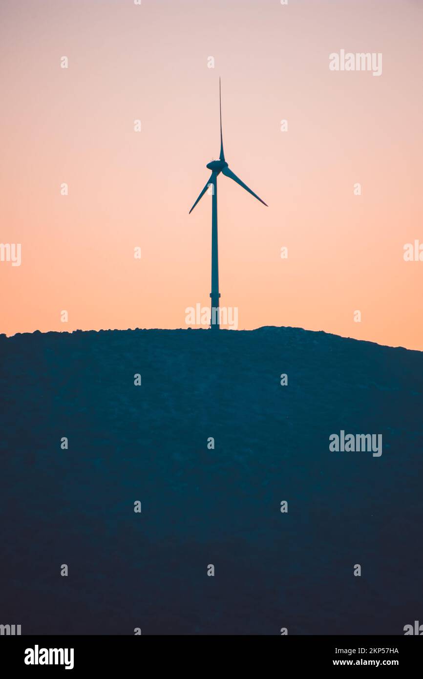 Wind turbine silhouettes at sunset Stock Photo - Alamy