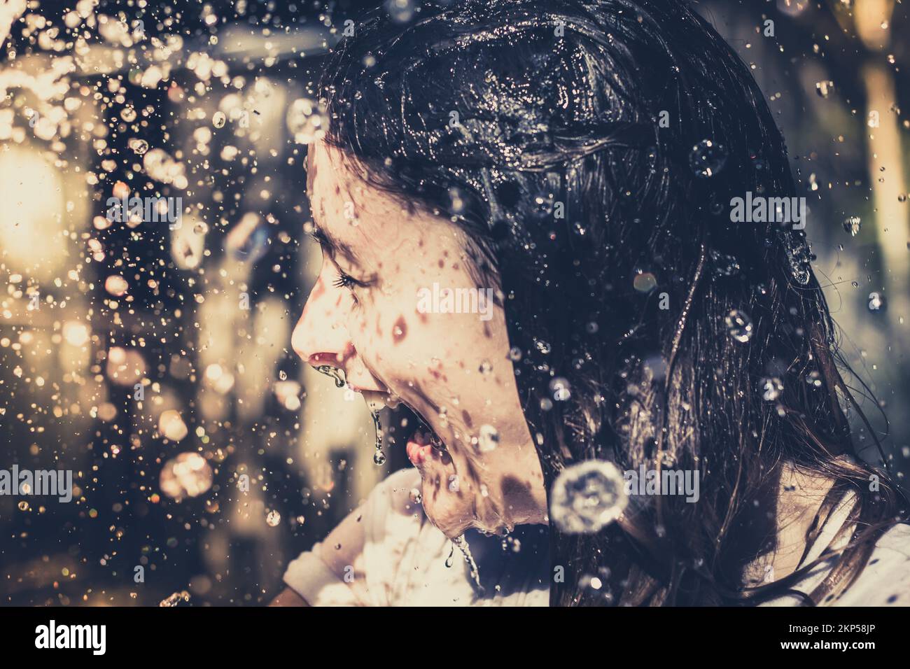 Candid unposed lifestyle image of a beautiful young woman having fun in