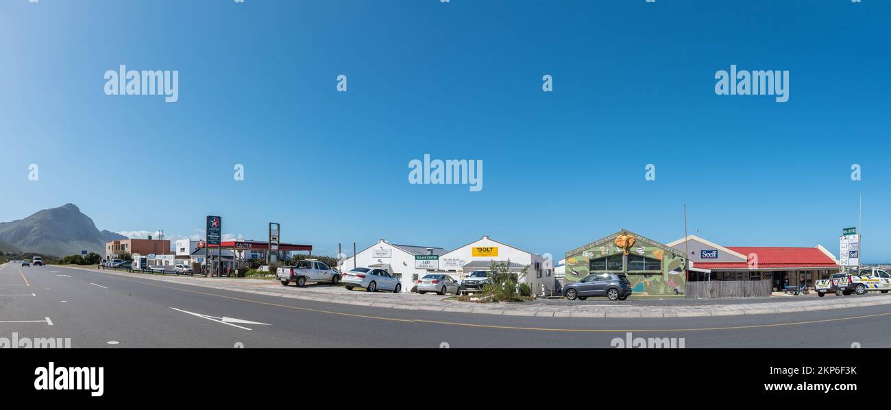 Bettys Bay, South Africa - Sep 20, 2022: A street scene, with businesses, people and vehicles, in Bettys Bay in the Western Cape Province Stock Photo