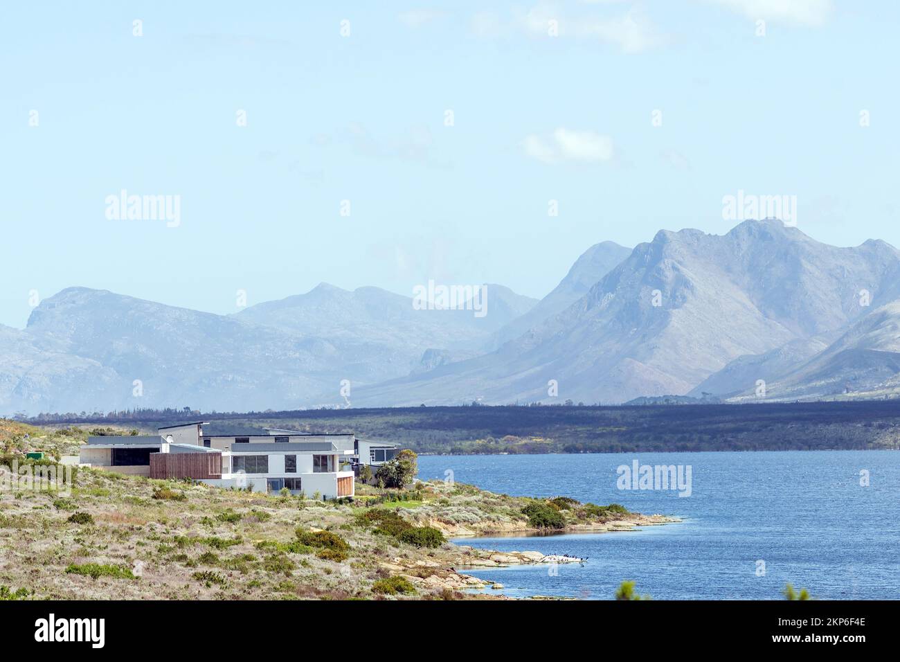 Hermanus, South Africa - Sep 20, 2022: Homes in Benguela Cove Wine Estate next to Botrivier Lagoon near Hermanus in the Western Cape Province Stock Photo