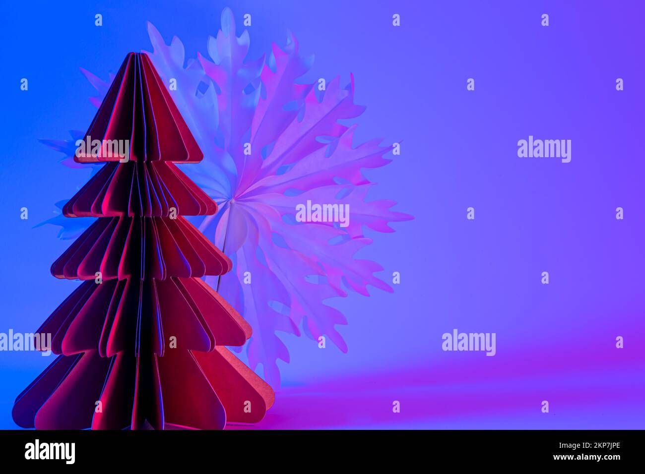 Paper Christmas tree and snowflake on neon gradient background Stock ...