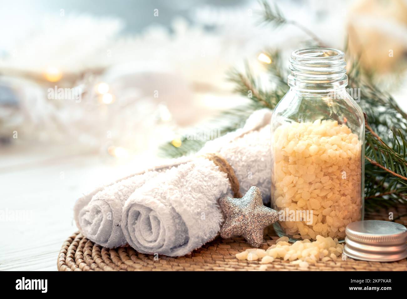 Winter spa composition with body care items and decor details. Stock Photo