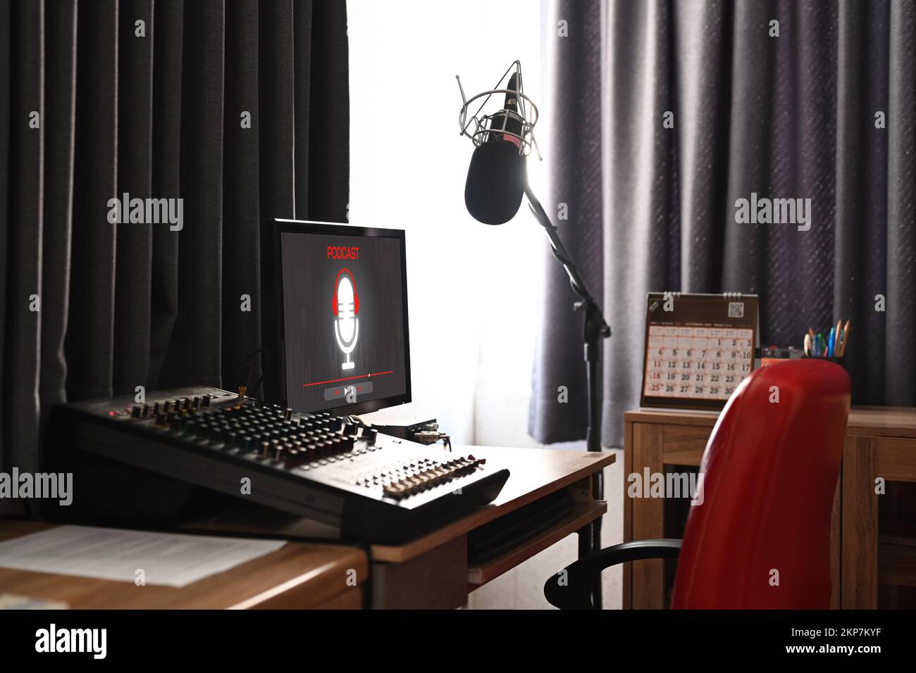 Home studio podcast interior with professional microphone, computer pc